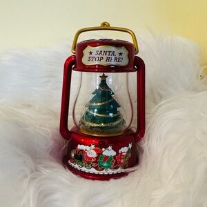 Hallmark Santa Stops Here Musical Light up ornament.